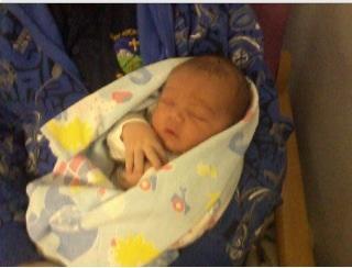 Me with my newborn  nephew